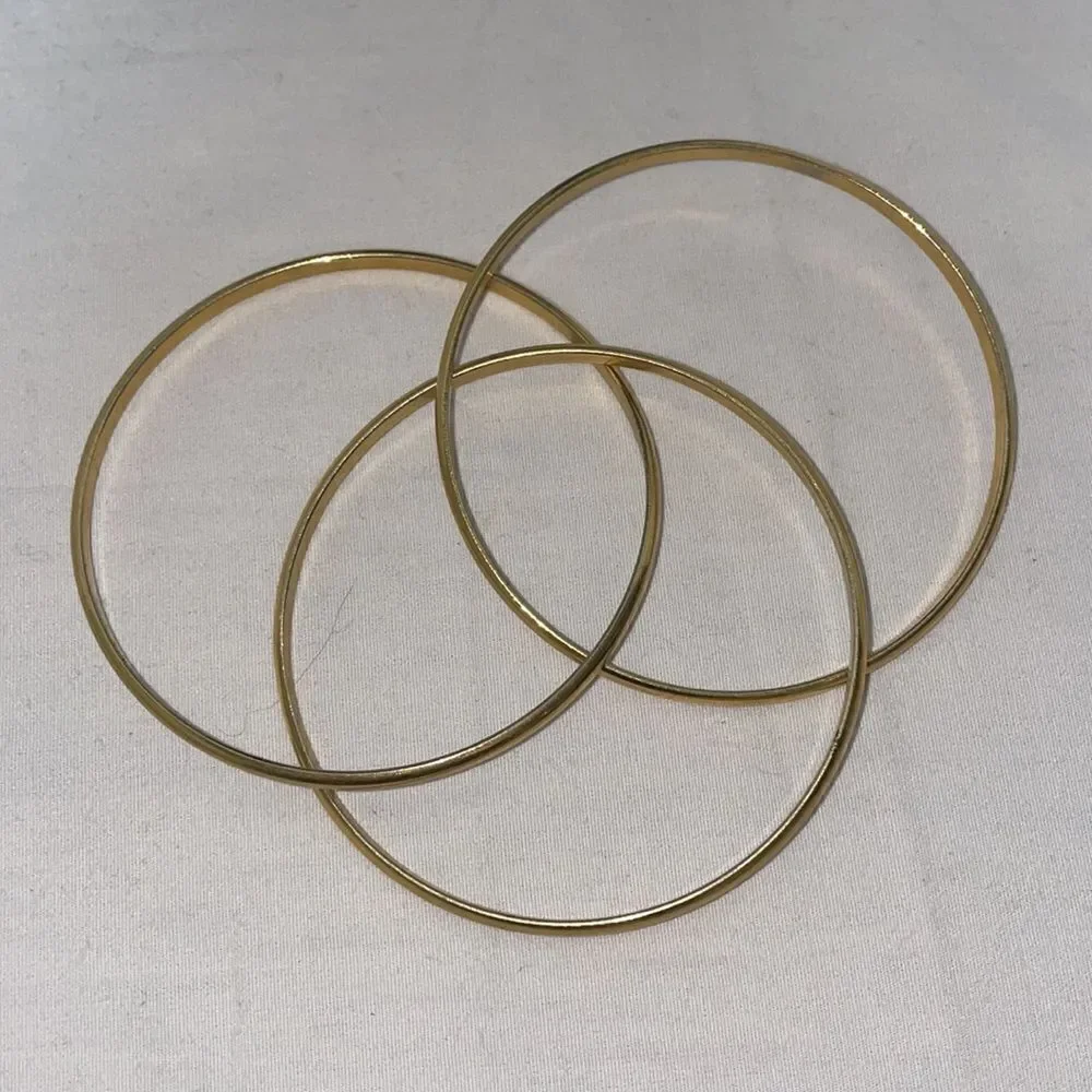 Three bangle bracelets
